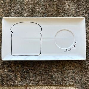 The Cellar Rectangular White Plate with Black Bread Design 12 inches by 7 inches
